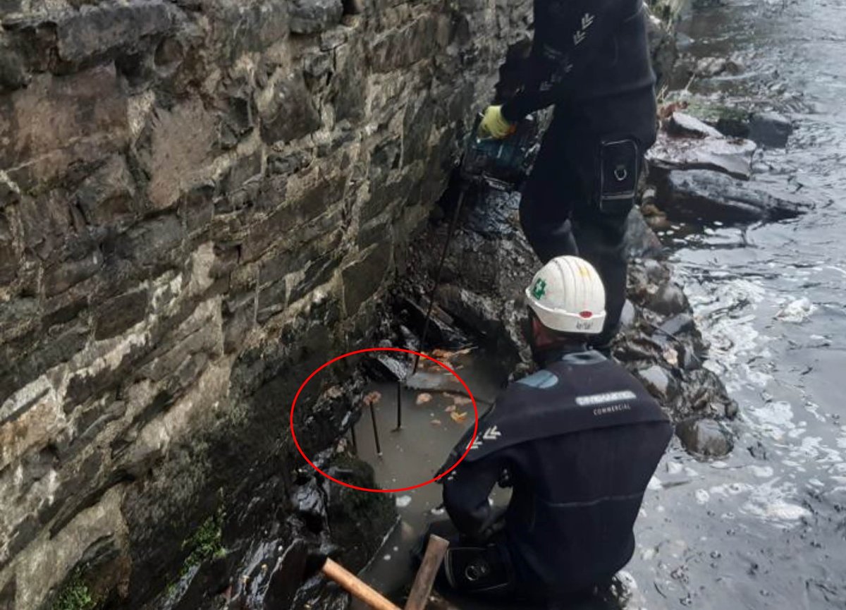 Drilling Steel Rods to Secure Bags to Bedrock